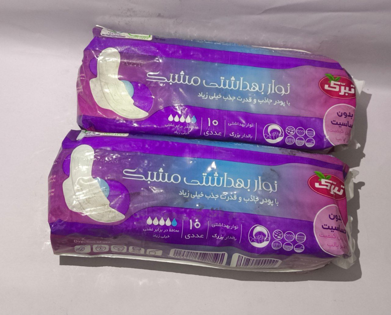 تبرك-نوار بهداشتي مشبك32تايي					